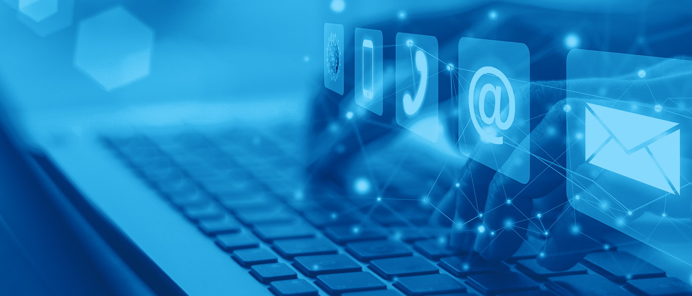 Blue digital communication icons hovering over a keyboard, symbolizing email, phone, and online interaction.