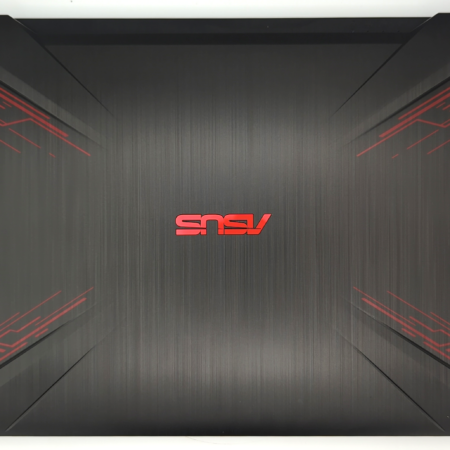 Gaming laptop with sleek black design and red accents, optimized for performance and style.