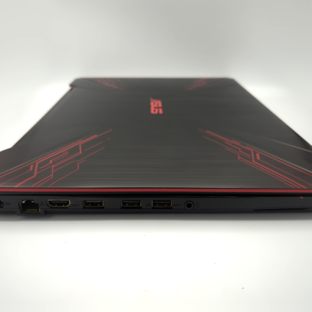 Gaming laptop showcasing ports on the side with sleek black and red design.