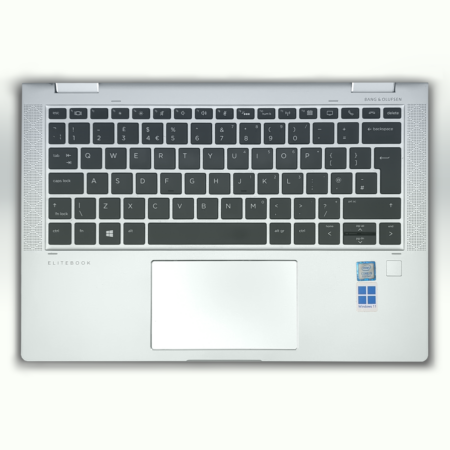 Silver laptop keyboard with touchpad, featuring Bang & Olufsen speakers and Intel Core i5, Windows 11 stickers.