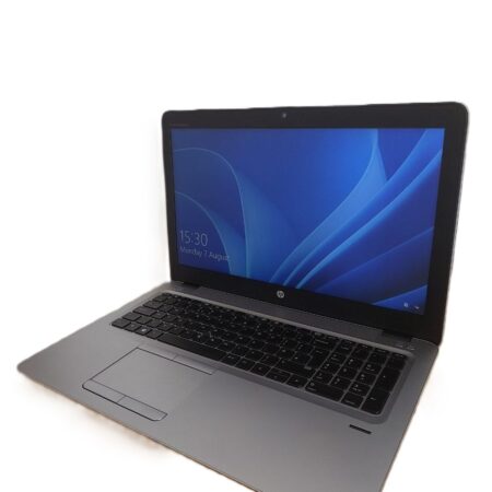 Sleek silver laptop with blue screen display on a white background, showcasing modern technology.