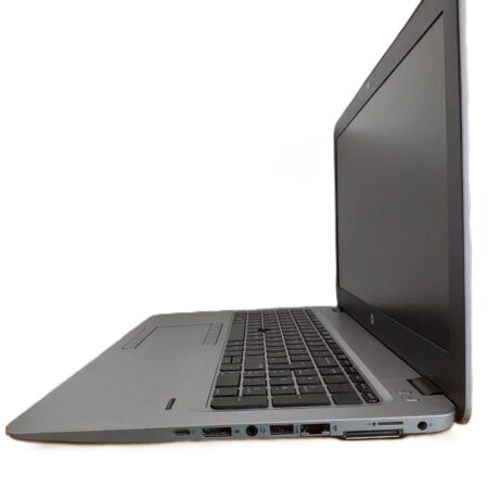 Side view of a sleek, open laptop showing keyboard, screen, and multiple ports, against a white background.