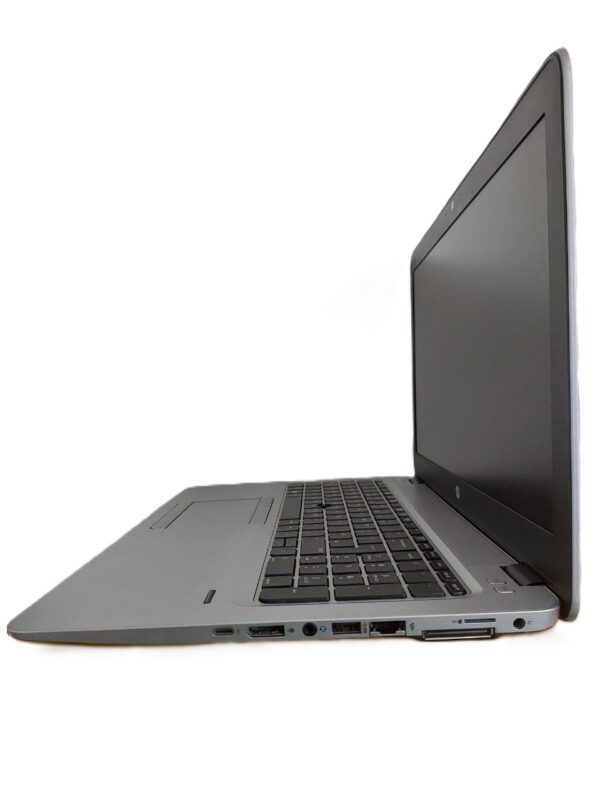 Side view of a sleek, open laptop showing keyboard, screen, and multiple ports, against a white background.