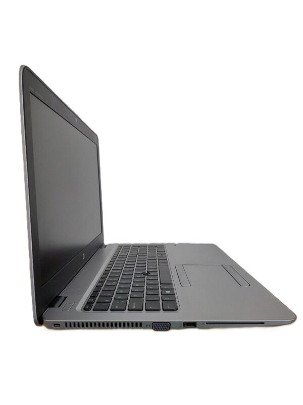 Side view of a sleek, slim laptop with open screen and visible keyboard, showcasing modern design and connectivity ports.