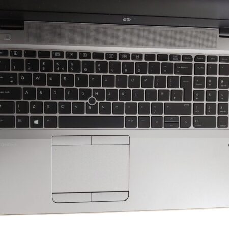 Top view of a laptop keyboard and touchpad on an HP EliteBook, featuring a sleek silver design and QWERTY layout.