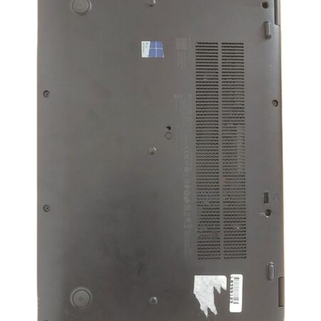 Bottom view of a laptop showing ventilation grilles and rubber feet.