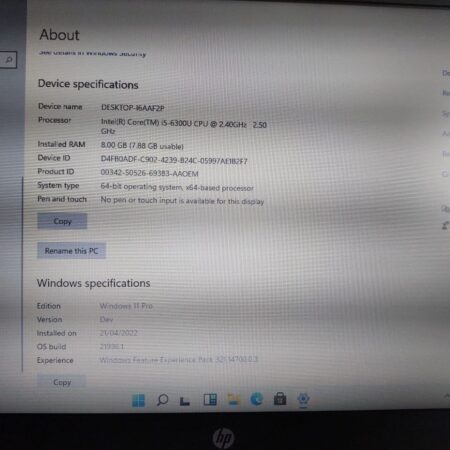 Computer system specifications: Intel Core i5, 8GB RAM, Windows 11 Pro OS details, displayed on screen.