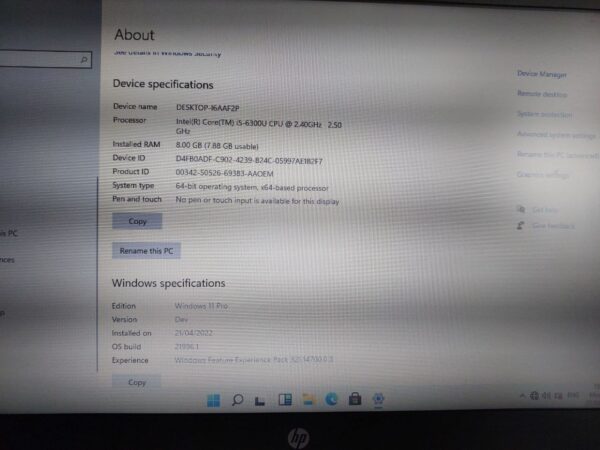 Computer system specifications: Intel Core i5, 8GB RAM, Windows 11 Pro OS details, displayed on screen.