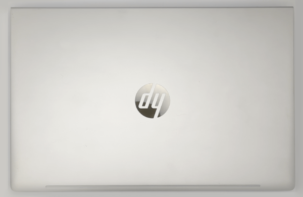 Silver laptop lid with sleek logo.