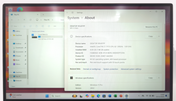 Computer system specifications window showing CPU and RAM details on Windows 11 Pro.