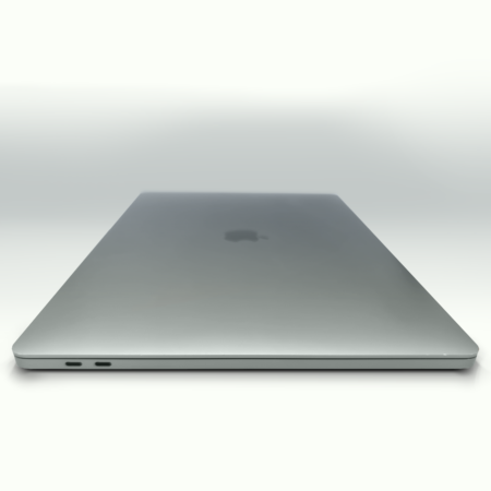 Sleek silver laptop closed on a white background, showcasing its minimalist design and compact profile.