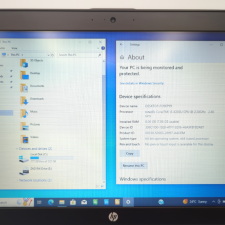 Laptop screen displaying Windows 10 PC specifications with Intel i5 processor and 8GB RAM.