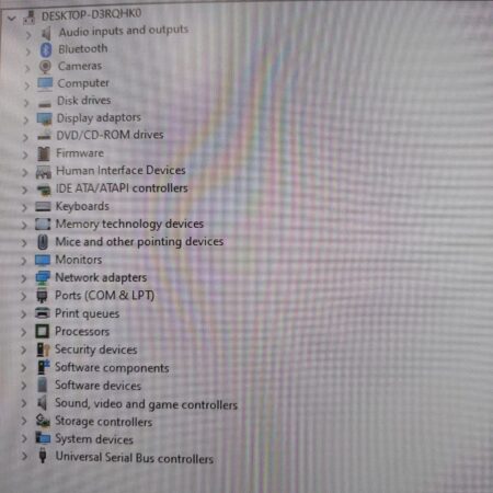 Windows Device Manager showing a list of computer hardware categories and devices.