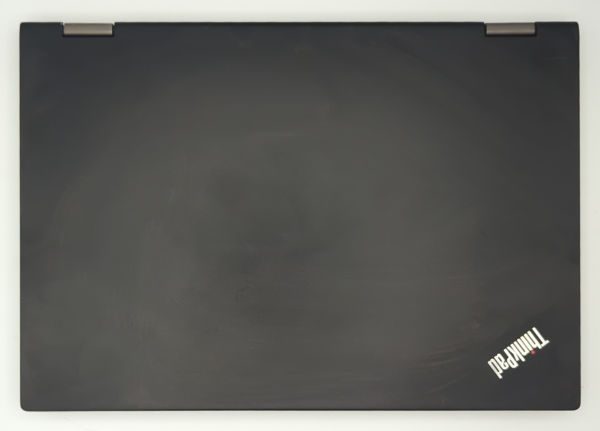 Black ThinkPad laptop cover with logo on a white background. Minimalist tech design.