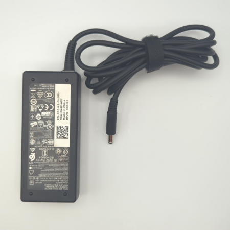Laptop power adapter with label details and attached cord, placed on a white background.