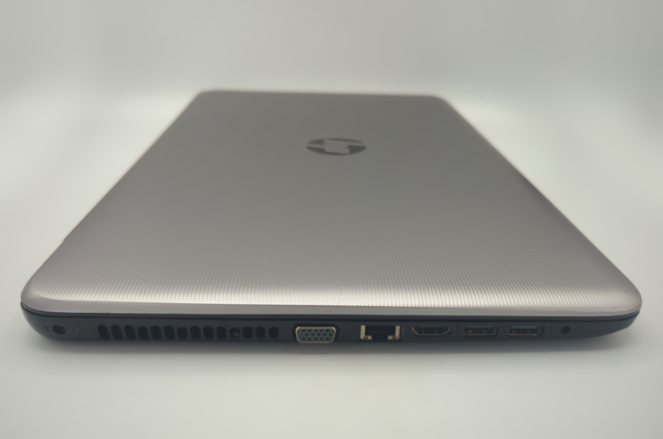 Slim silver laptop showing side ports including HDMI and USB on a white background.