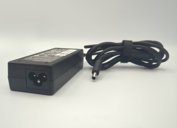 Laptop power adapter with black cable on a white background.