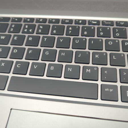 Close-up of a laptop keyboard showing QWERTY layout with function keys, perfect for typing and productivity.
