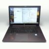 Open HP laptop with visible Windows 10 interface and applications on screen.
