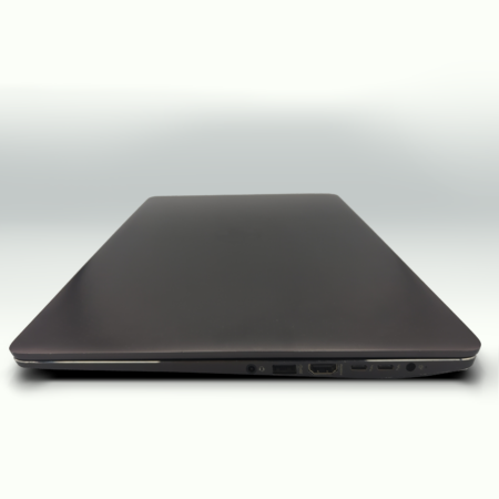 Sleek closed laptop side view with multiple ports, showcasing modern design and connectivity options.