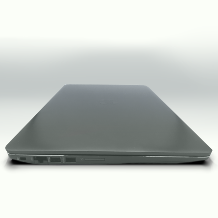 Sleek closed silver laptop with visible ports on the side, showcasing modern design and functionality.